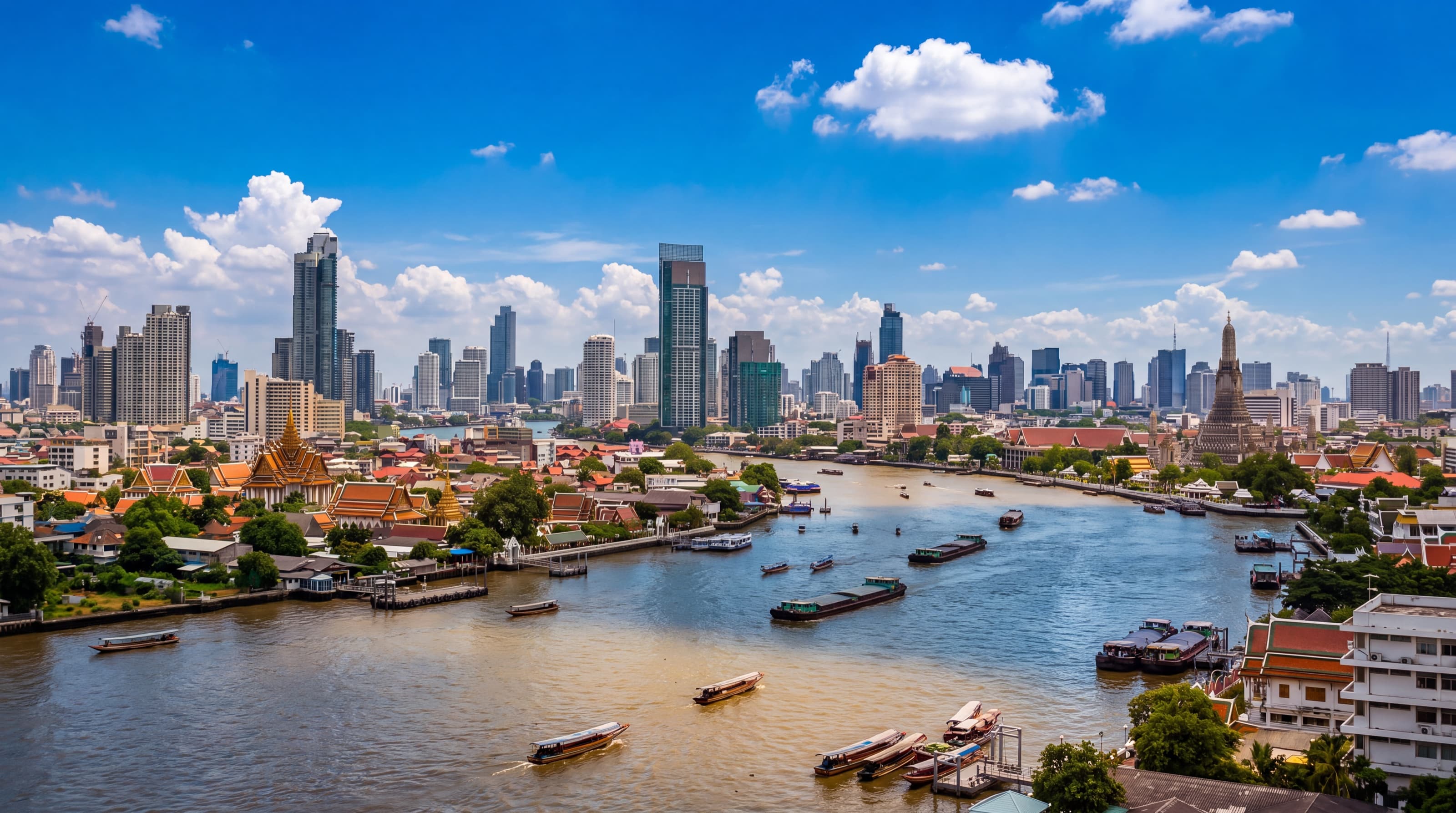 Daytime view across the Bangkok skyline, with the Sukhumvit corridor running through the middle of the city